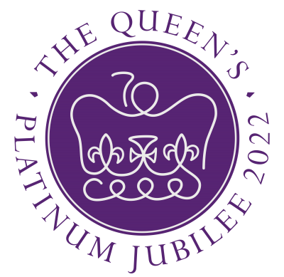 A purple circle bears the outline of a crown. Words around the edge read The Queen's Platinum Jubilee 2022