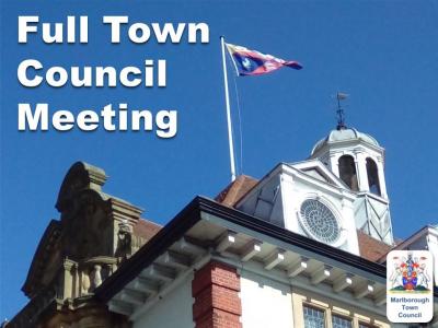 the roof of an elaborate building against a blue sky. There is a flag fluttering on a pole.  Caption reads FULL TOWN COUNCIL MEETING and there is a heraldic crest with the words Marlborough Town Council