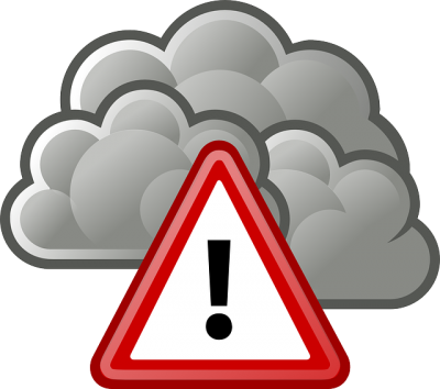 a warning triangle with a dark cloud