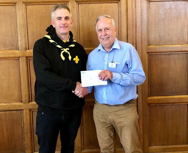 Peter Wilkinson receives £800 for Savernake Explorer Scouts Scouts