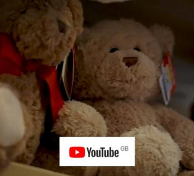 an image of teddy bears with a YouTube logo. The image is a link to a video